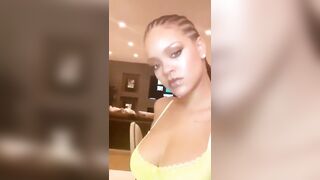 Rihanna selfie showing her big cleavage in a bra