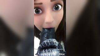 Spidergirl trying to deep throat a massive black dildo.