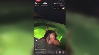 Hot busty milf in pool
