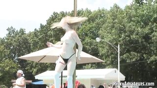 Amateur blonde is on the stage teasing the crowd