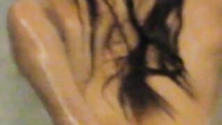 Jaripha Suticost fingers her own Anus in the bath