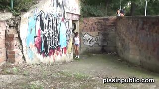 Desperate girls must pee in public park but get caught