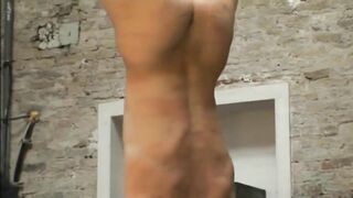 Suspended upside down and bullwhipped