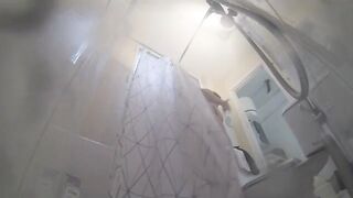 Natalia gets caught soaping her BIG TITS in the shower