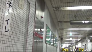 Asians filmed pissing