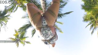 Shibari on public beach with lordshibarifloripa