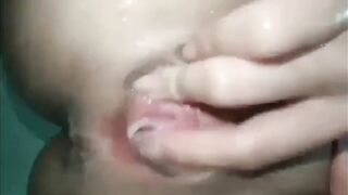 Pinay fingering her wet pussy in the shower