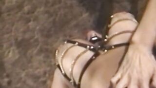 Busty blonde sub tied up for spanking in BDSM dungeon