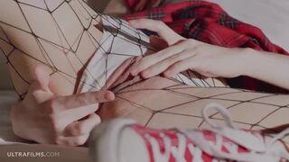 Super hot redhead girl Sherice masturbating on her bed wearing fishnets
