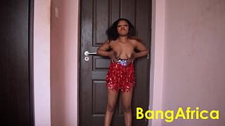 Ebony with nice breasts shakes them