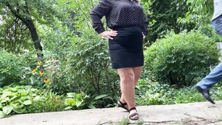 Hot MILF in short skirt helps man give golden shower