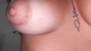 Young wife with the perfect body sucking and sitting