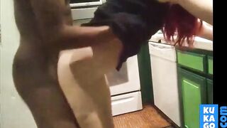 Interracial couple fucking in kitchen