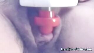 a woman pumps her clit into a dick