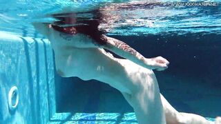 Russian Sheril teen submerged underwater