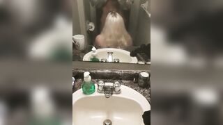 Mirror blowjob in the bathroom