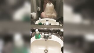 Mirror blowjob in the bathroom