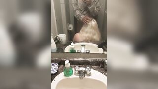 Mirror blowjob in the bathroom