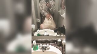 Mirror blowjob in the bathroom