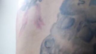fake-breasted tattooed latin cam-slut