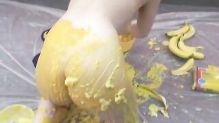 Horny babe solo is caressing herself in food substances on the floor