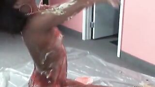 Cute bitch rubbing ice cream all over her sexy body