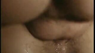 Brunette MILF gets double penetration action on the kitchen table