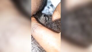 Rubbing her wet tight pussy