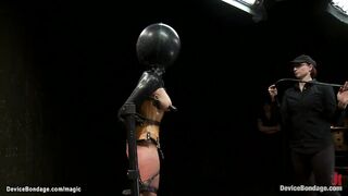 Trapped head in latex ball slut whipped