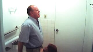 Bathroom slut sucks dick in restroom