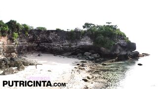 Asian Babe Putri Cinta fingering her bum hole at the beach