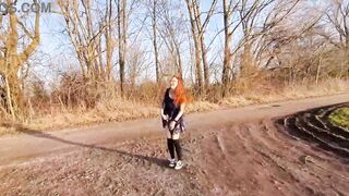 Redhead young woman undresses outside for the first time.