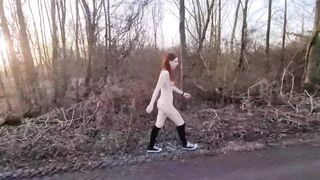 Redhead young woman undresses outside for the first time.