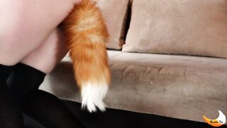 A studentgirl with a fox tail is having fun. MadamFox