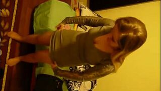 Young polish blonde teen girl putting on her pantyhose and dress, dressing up