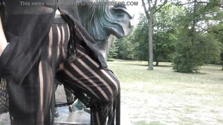 Hairy mature in transparent dress flashing in the park