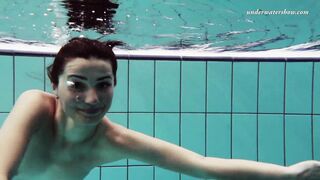 Underwater babe Nina wet and horny