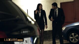 The hot secretary gets seduced on a public parking