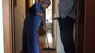 A Muslim cleaning maid is disturbed when she sees his big black cock