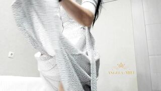 The most beautiful MILF dances a striptease, waving panties and shaking huge tits / Angela-MILF