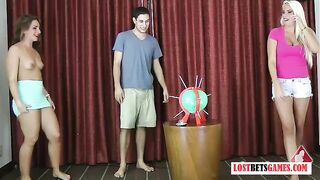 2 girls and one guy play a don't pop the ball