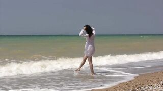 Dark Haired Water Nymph Xenobia Swims Naked On The Beach!