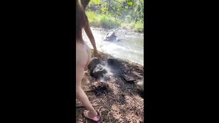 My friend showing her ass in the river