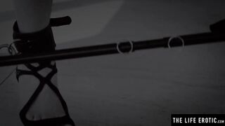 Long legs spread wide as she masturbates with a vibrating wand