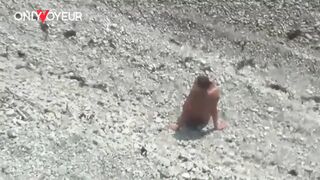 Beach Voyeur. Hot babe the beach totally naked and with buttplug in her ass