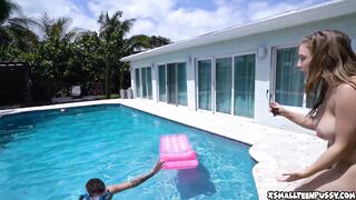 Busty teen relaxes naked in her pool