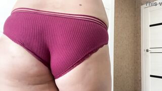 Nude MILF with big boobs trying on panties