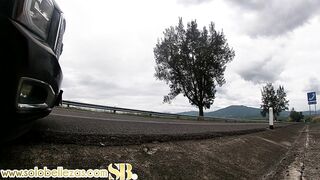 boys are recorded in the middle of the road taking each other for said challenge