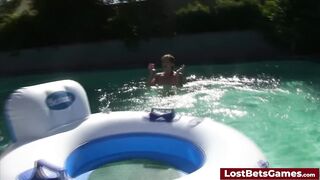 Getting his hard dick sucked by the pool after playing a strip game with 2 babes
