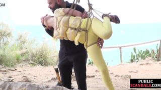 Public slut anal toyed outdoors by dominators in threesome